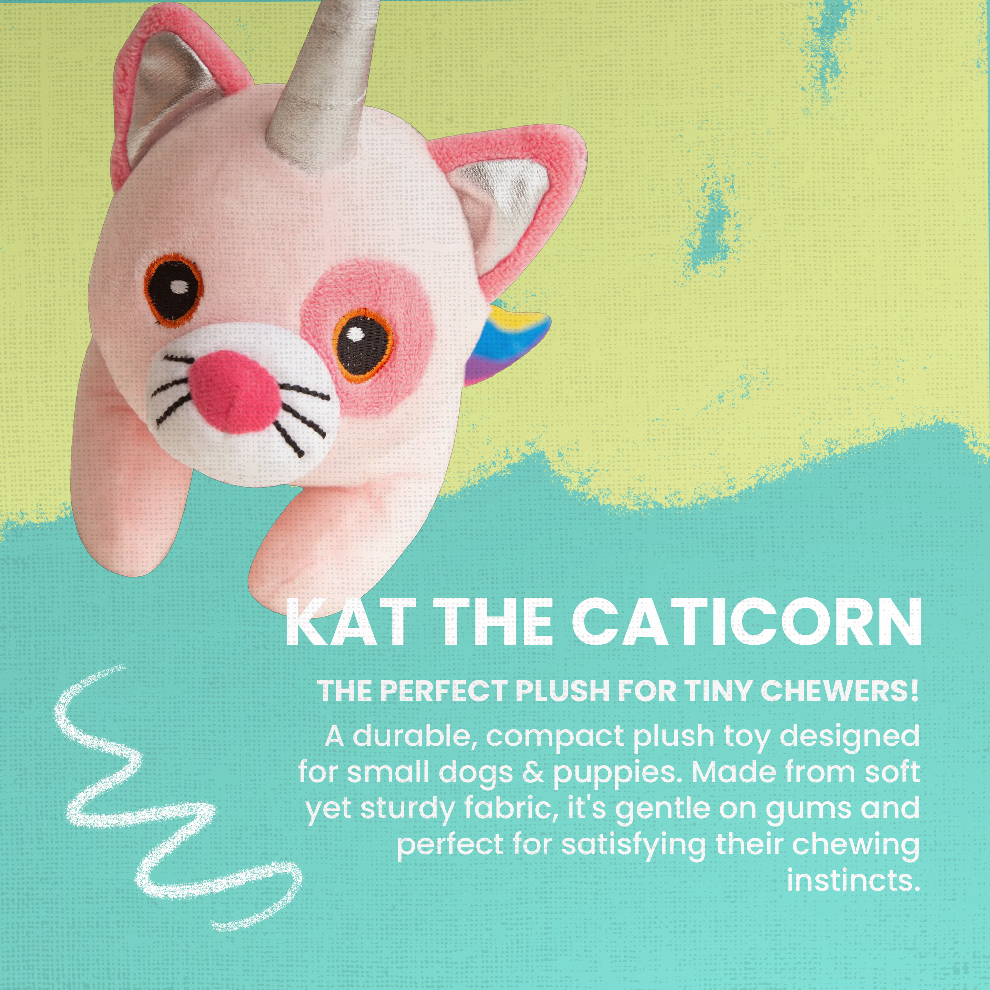 Kat the Caticorn by Snugarooz is a pink plush dog toy with a silver horn and rainbow tail, shown on a green textured background. This durable, gentle toy is ideal for small dogs and puppies, perfect for play or cuddles.