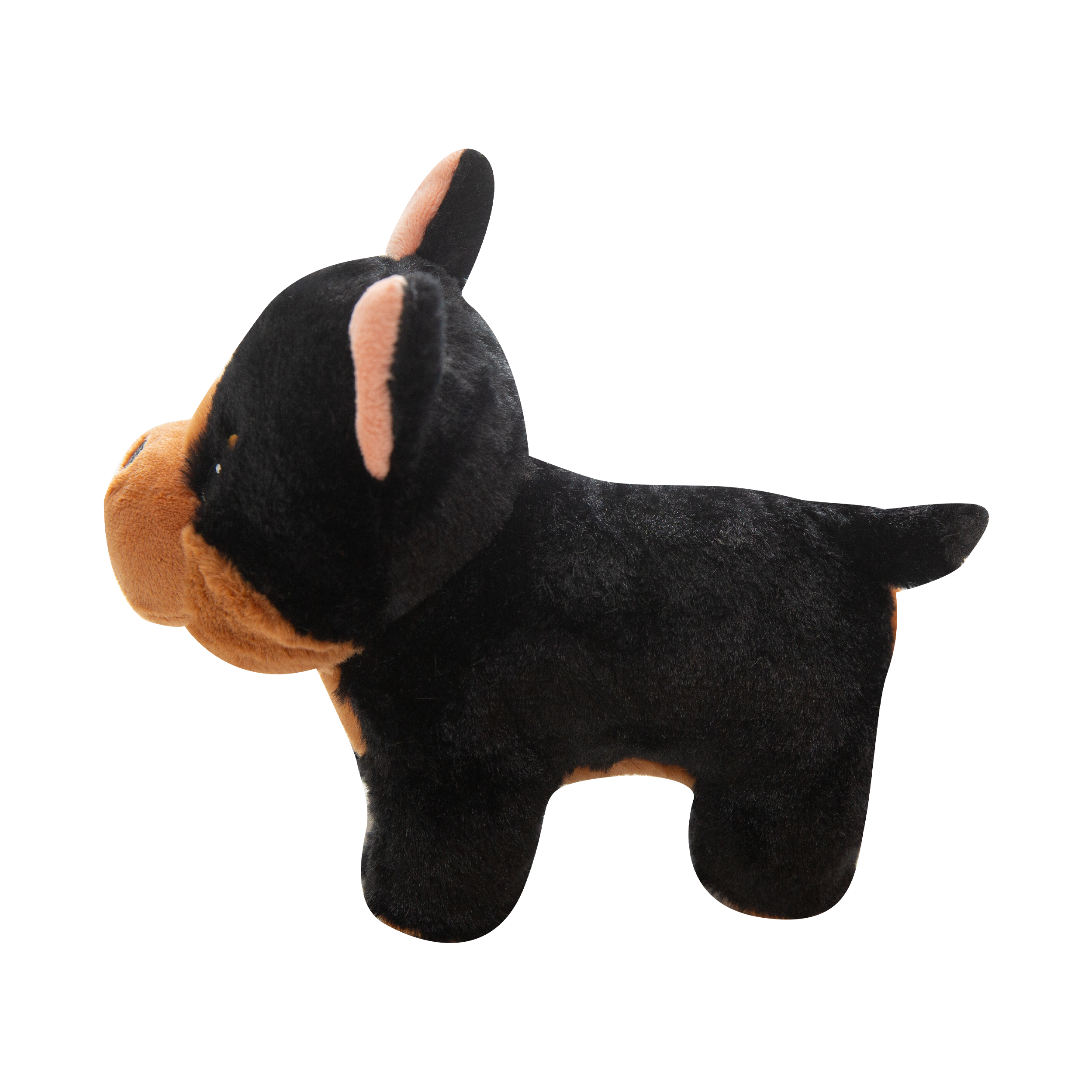 The Snugarooz Diesel plush dog toy features a black and brown pup with upright ears, a rounded snout, and a friendly smile, shown facing forward against a plain white background.