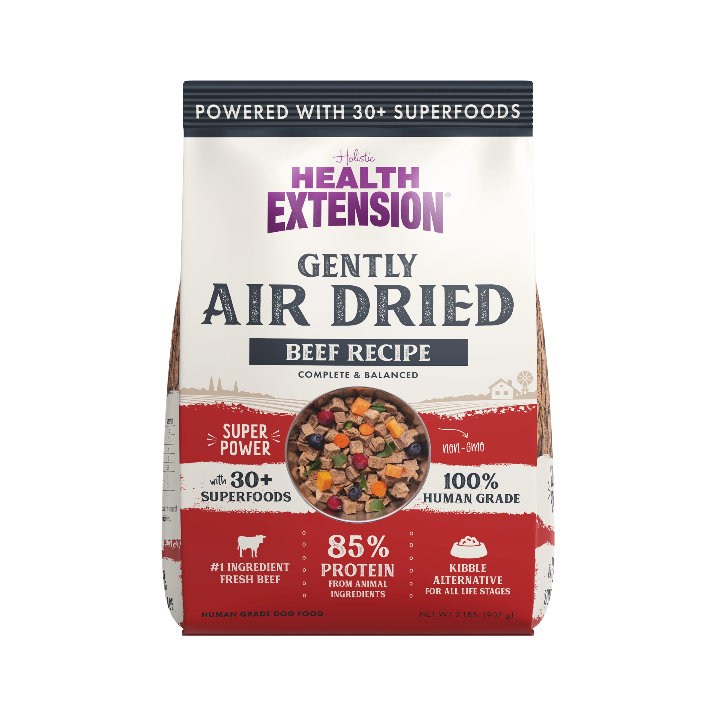 Packaging of Health Extension Gently Air Dried Beef Recipe dog food, emphasizing key features such as being powered with over 30+ superfoods, containing 85% protein from animal ingredients, and being a 100% human-grade kibble alternative for all life stages. The front view shows the product name, a window displaying the air-dried food, and badges highlighting the #1 ingredient as fresh chicken, non-GMO, and suitable for all life stages.