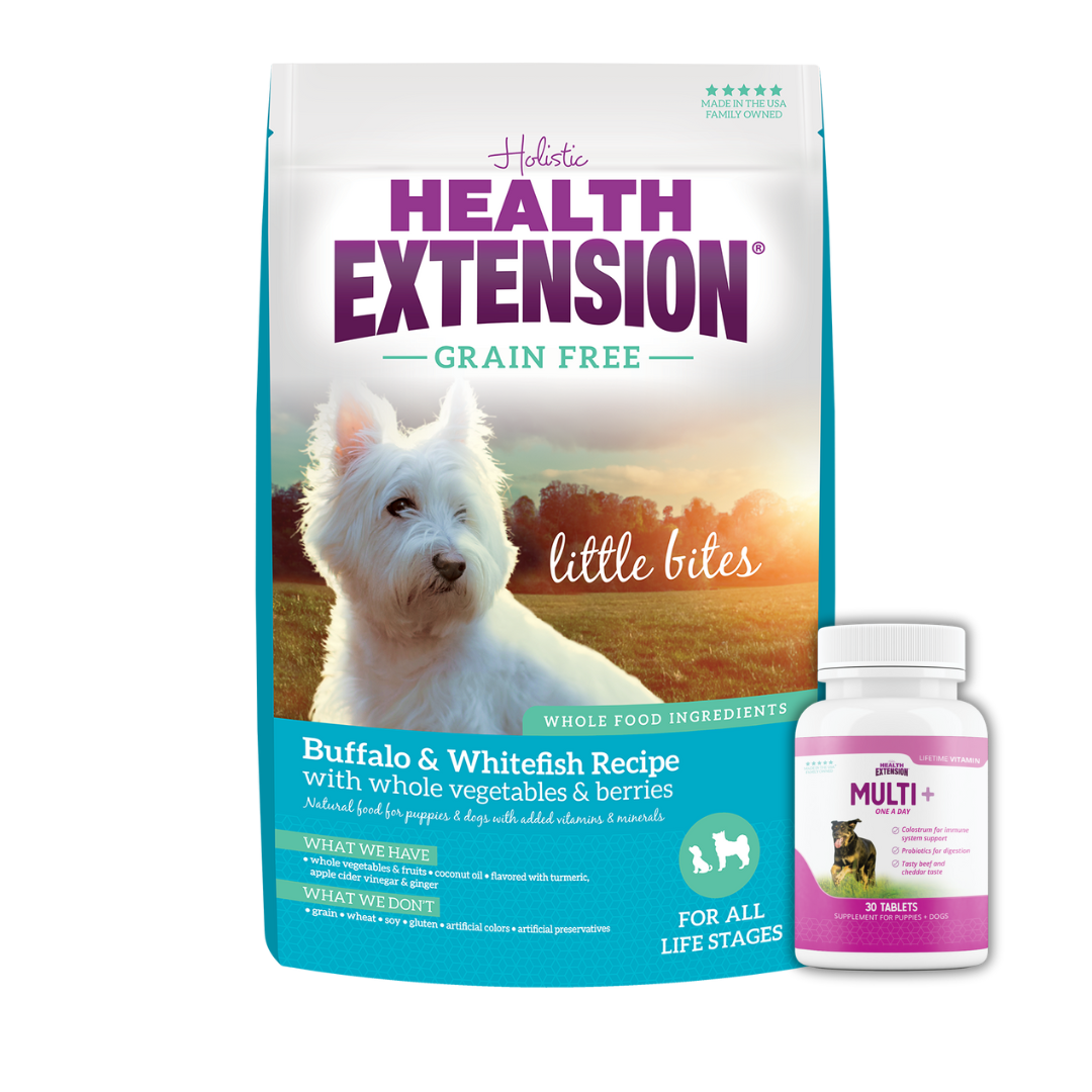 Health Extension Little Bites Grain-Free Buffalo & Whitefish Recipe dog food package next to a bottle of Multi+ dog vitamins, featuring a white terrier on the front.