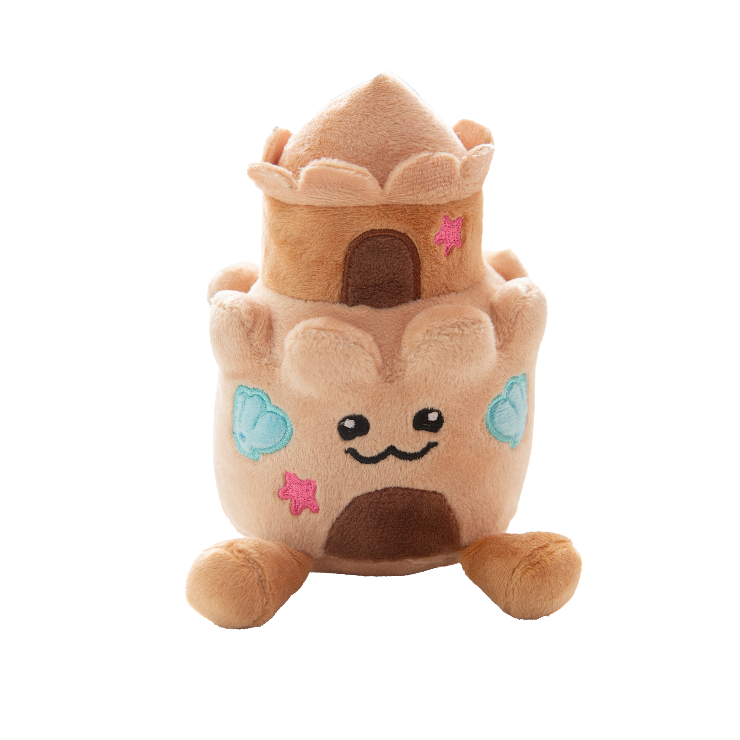 The Snugarooz Snugz Castle is a plush dog toy shaped like a sandcastle, featuring a smiling face, blue shell designs, pink starfish accents, and a brown doorway on a white background.