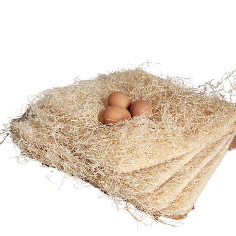 Fresh Eggs Daily Nesting Pads & Nest Herb Sample by Fresh Eggs Daily Shop are shown with brown eggs resting on the straw-like nesting pads, arranged on a stack of rectangular mats against a white background.