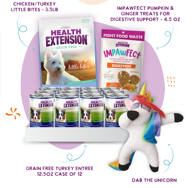 Image showcasing pet food products including a bag of Health Extension Little Bites, a case of twelve cans of Grain-Free Turkey Entrée, and a package of Impawfect pumpkin and ginger treats for digestive support, alongside a plush toy unicorn named 'Dab the Unicorn'.