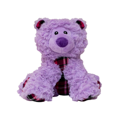 Bella the Bear by Snugarooz is a fluffy purple teddy dog toy with plaid accents on its belly, feet, and ears. Sitting upright against a white background, this plush squeaky toy is perfect for your pup.