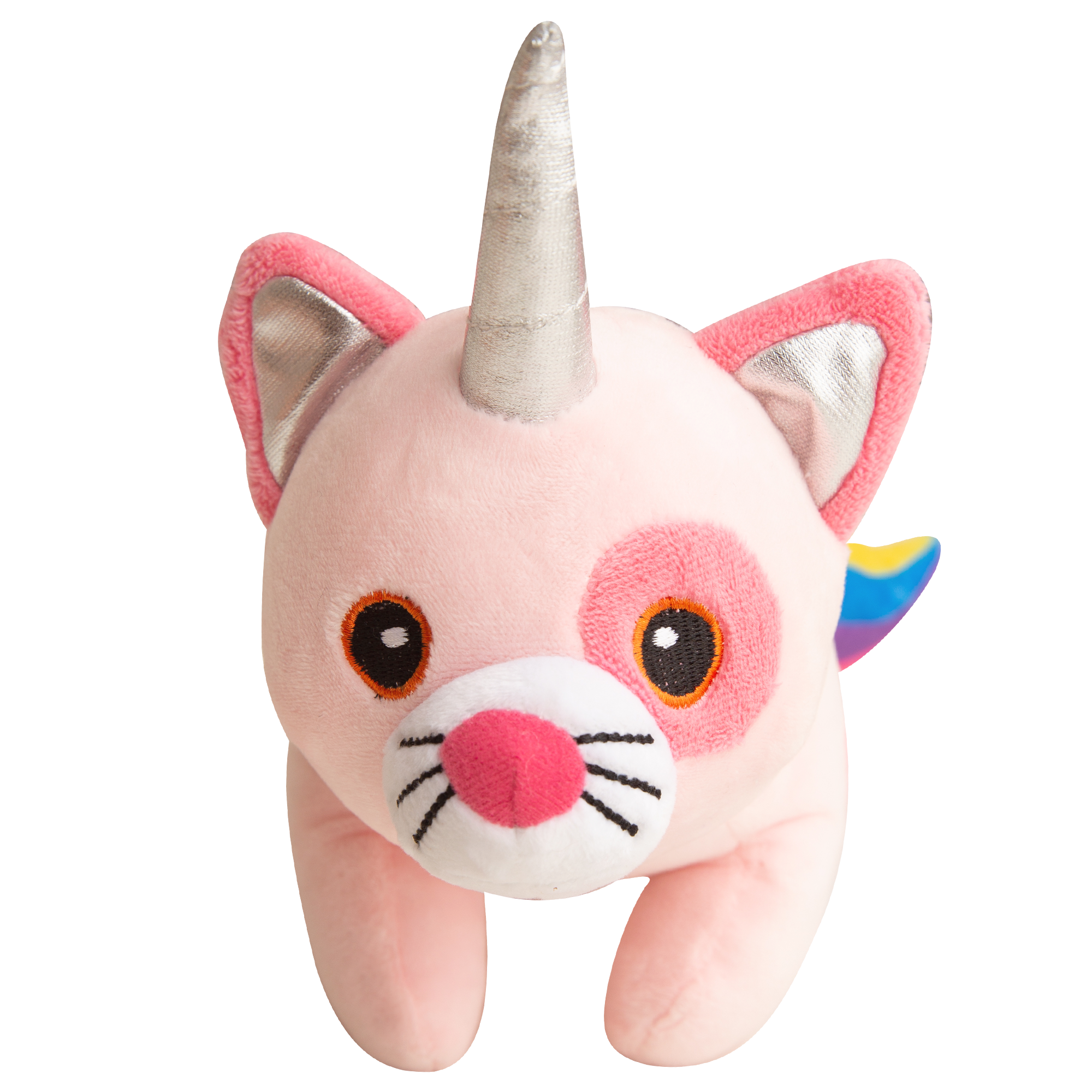 Kat the Caticorn by Snugarooz is a pink plush dog toy with a silver horn and rainbow tail, shown on a green textured background. This durable, gentle toy is ideal for small dogs and puppies, perfect for play or cuddles.