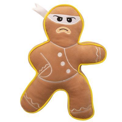 The Snugarooz Ninja Bread Man is a durable plush dog toy shaped like a gingerbread man, featuring a serious expression, white headband, yellow trim, and arched eyebrow for a ninja-like Christmas look.