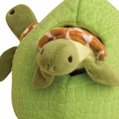 The Snugarooz Hide & Seek Reef is a soft, green plush turtle house with three small brown and green turtles that poke out of side holes—an interactive dog toy designed to provide mental stimulation for dogs.