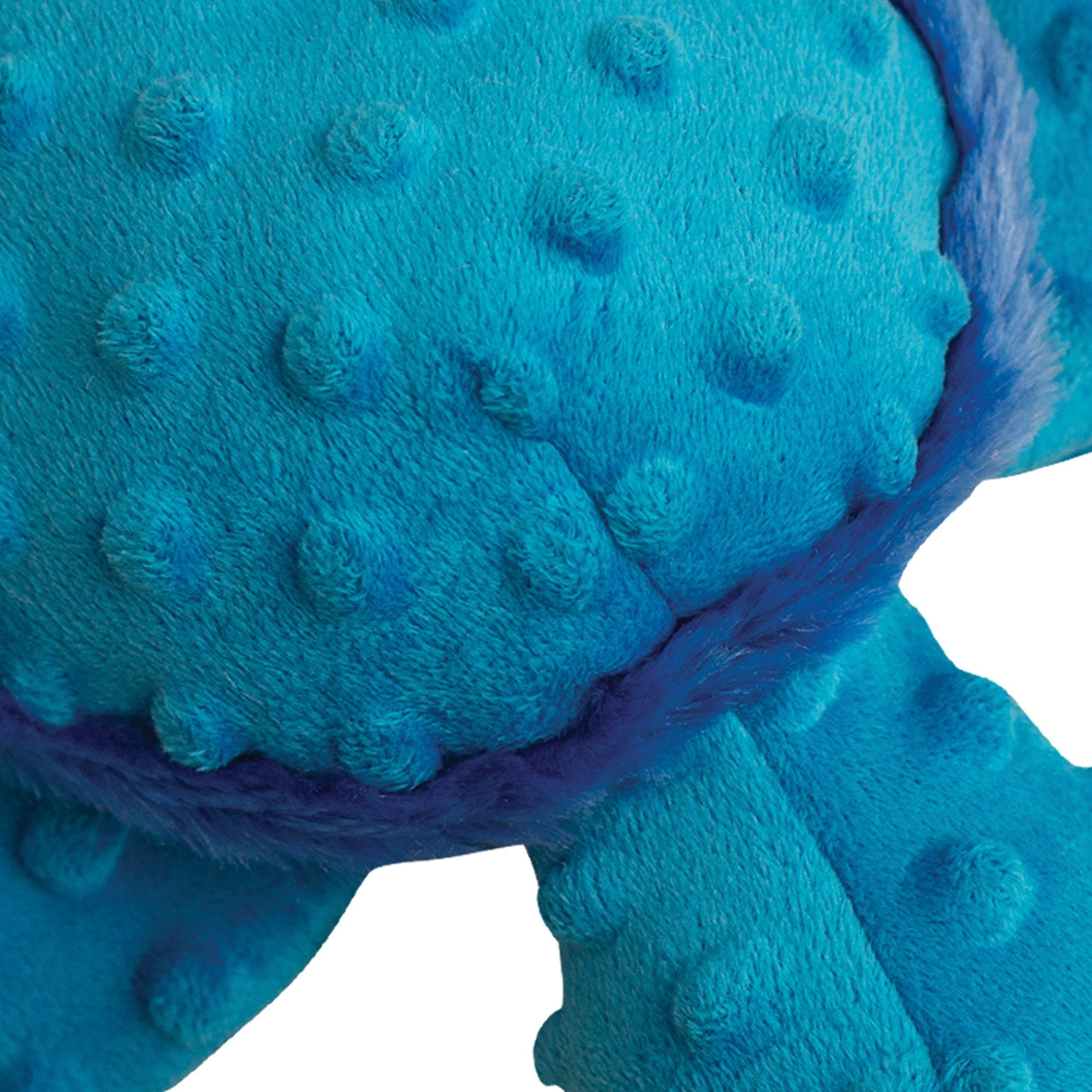 A circular diagram illustrates plastic bottles being recycled into fiber and used as stuffing for Snugarooz’s Tucker the Turtle plush toy for medium dogs, with "Made from Recycled Water Bottles" in the center.