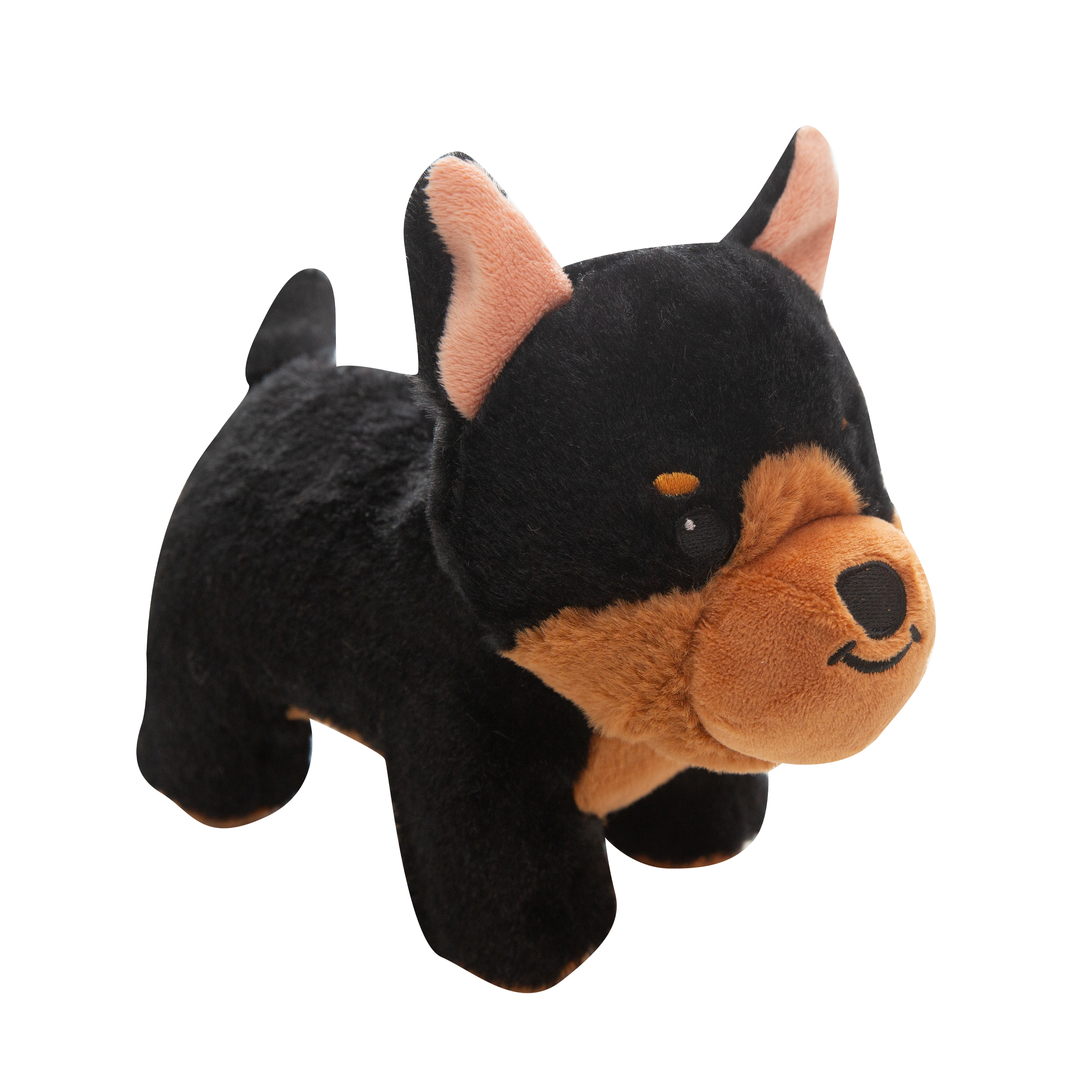 The Snugarooz Diesel plush dog toy features a black and brown pup with upright ears, a rounded snout, and a friendly smile, shown facing forward against a plain white background.