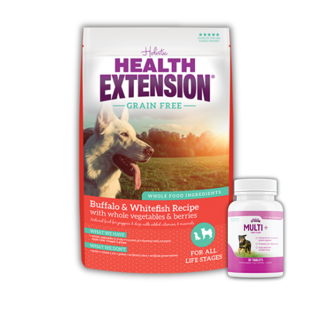 Bag of Health Extension Grain-Free Buffalo & Whitefish Recipe dog food with a picture of a white dog on the front, alongside a bottle of Multi+ vitamins for dogs.