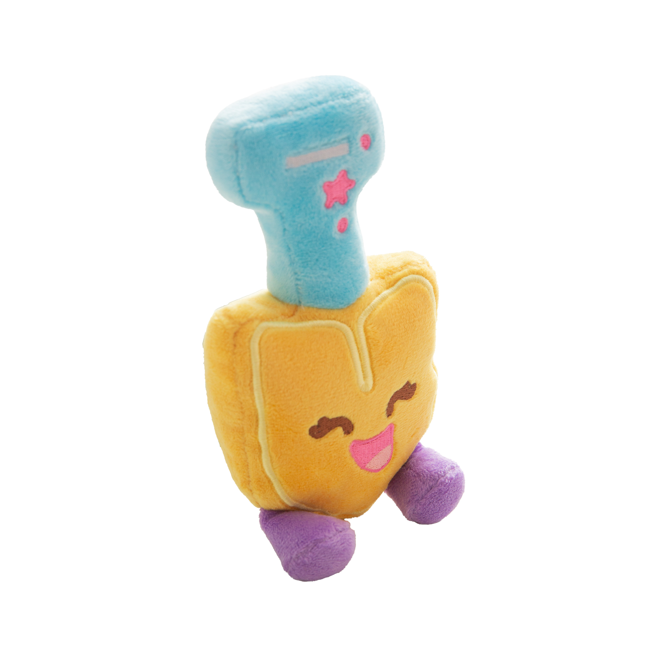 The Snugarooz Scoop There It Is is a plush dog toy shaped like a smiling yellow shield with embroidered details, purple legs, a blue top with pink stars and dashes, made from recycled water bottles—great for interactive play.