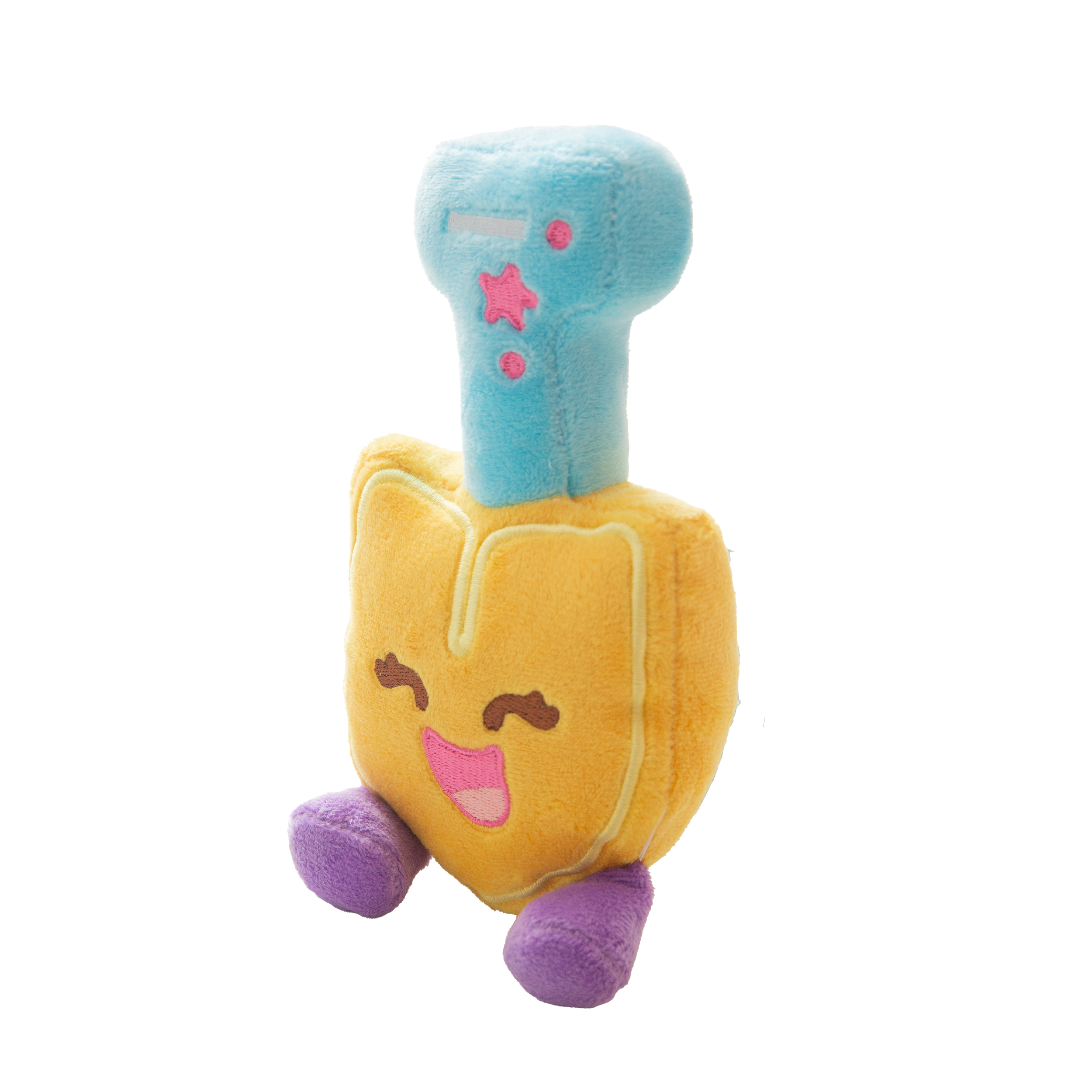 The Snugarooz Scoop There It Is is a plush dog toy shaped like a smiling yellow shield with embroidered details, purple legs, a blue top with pink stars and dashes, made from recycled water bottles—great for interactive play.