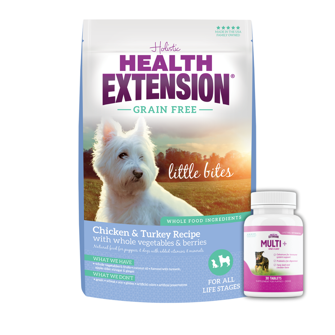 Bag of Health Extension Little Bites Grain-Free Chicken & Turkey Recipe dog food next to a bottle of Multi+ dog vitamins.