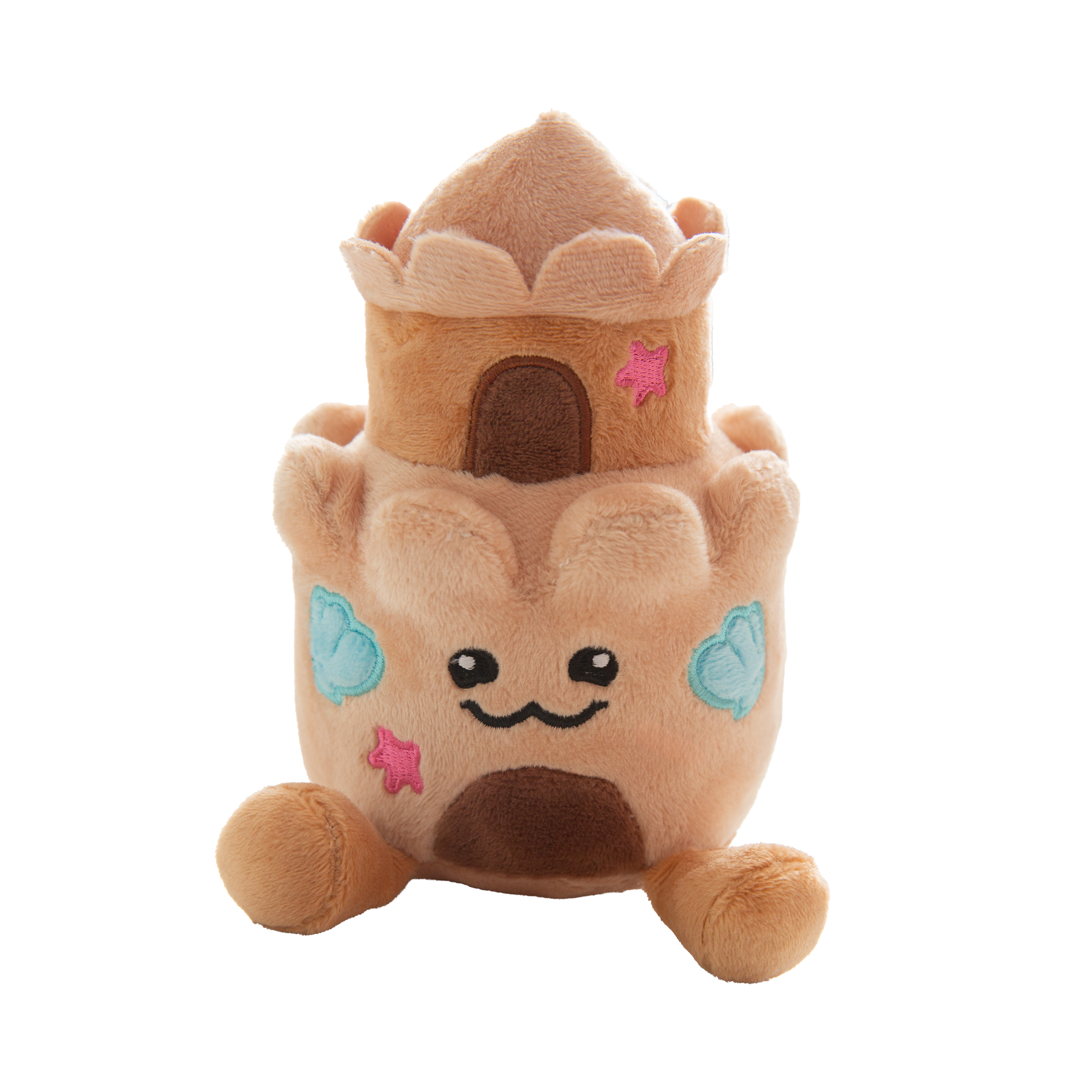 The Snugarooz Snugz Castle is a plush dog toy shaped like a sandcastle, featuring a smiling face, blue shell designs, pink starfish accents, and a brown doorway on a white background.